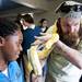 Snake handler David Clipner shows kids an albino Burmese Python during Earth Day on Sunday, April 21. AnnArbor.com I Daniel Brenner